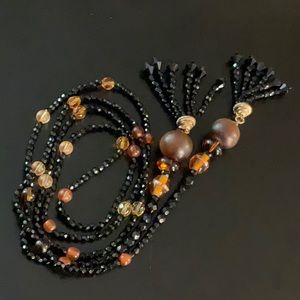 Onyx and amber glass beads necklace or belt long strands with fringed ends.